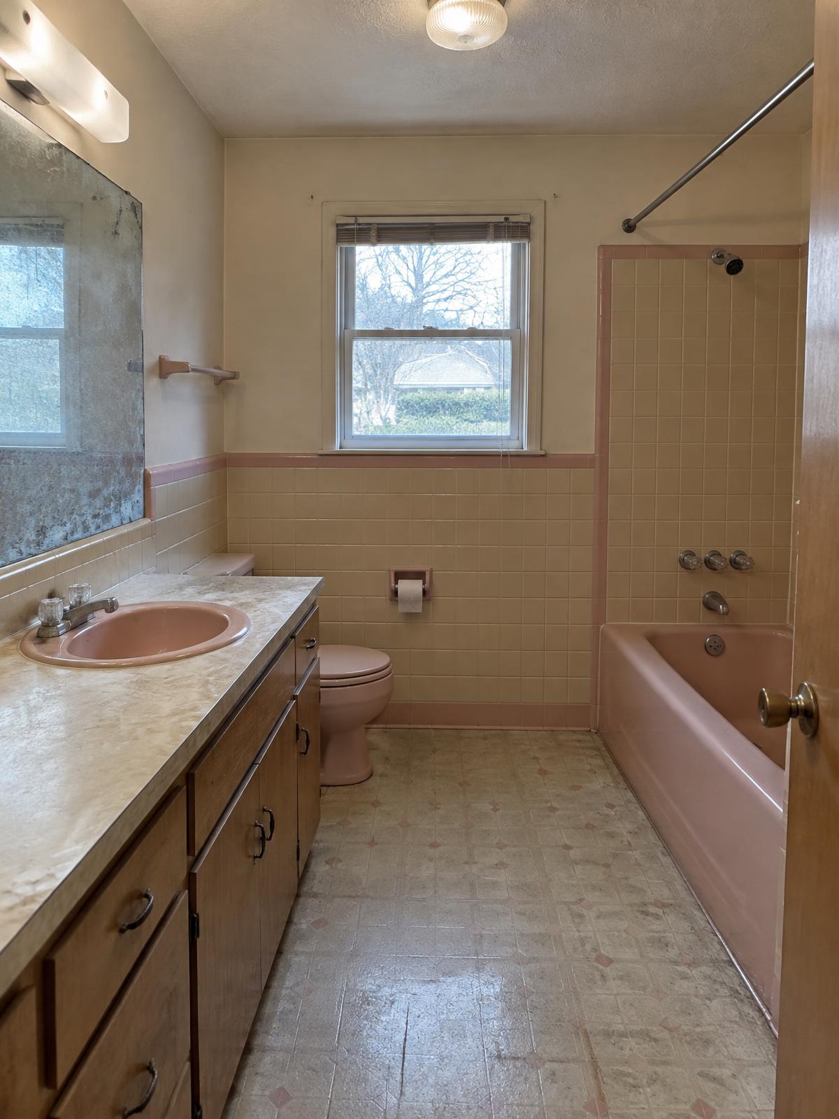 A pink 1980s bathroom in Portland before renovation